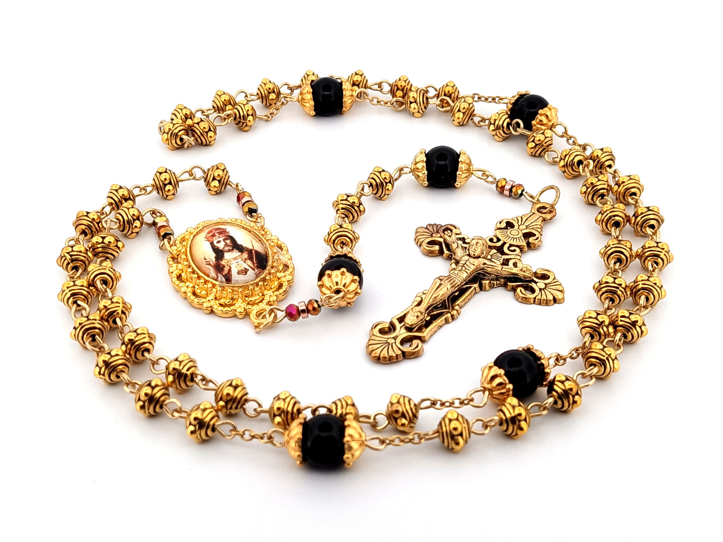 Christ the King gold plated silver and onyx gemstone unique rosary beads with gold plated filigree crucifix.