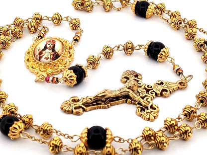 Christ the King gold plated silver and onyx gemstone unique rosary beads with gold plated filigree crucifix.