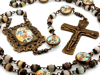 Saint Michael crazy lace agate gemstone unique rosary beads with bronze Holy Trinity crucifix.