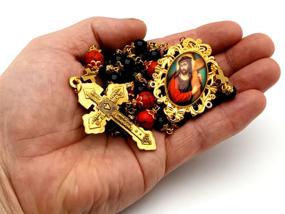 Carrying of the Cross onyx and howlite gemstone unique rosary beads with gold plated Pardon crucifix.