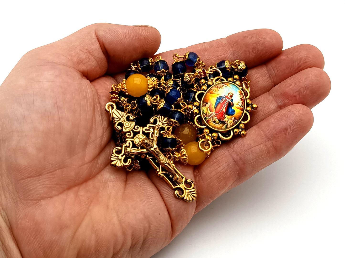 Our Lady Undoer of Knots blue and pale orange glass unique rosary beads with gold plated filigree crucifix.