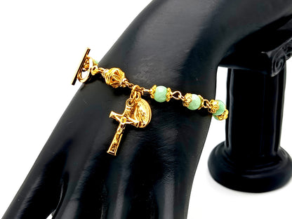 Miraculous Medal green quartz gemstone single decade rosary bead bracelet with small gold plated crucifix.