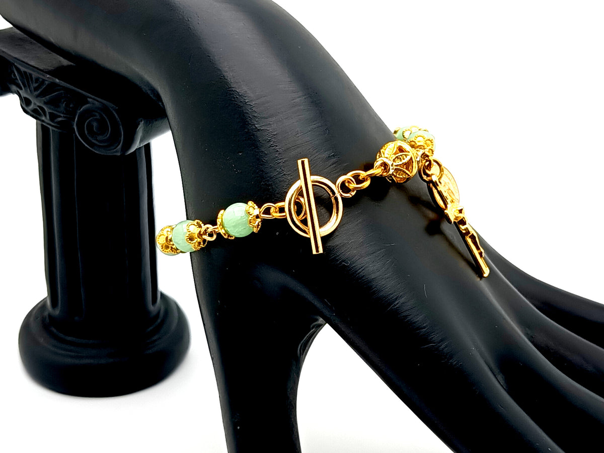 Miraculous Medal green quartz gemstone single decade rosary bead bracelet with small gold plated crucifix.