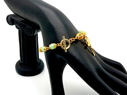 Miraculous Medal green quartz gemstone single decade rosary bead bracelet with small gold plated crucifix.