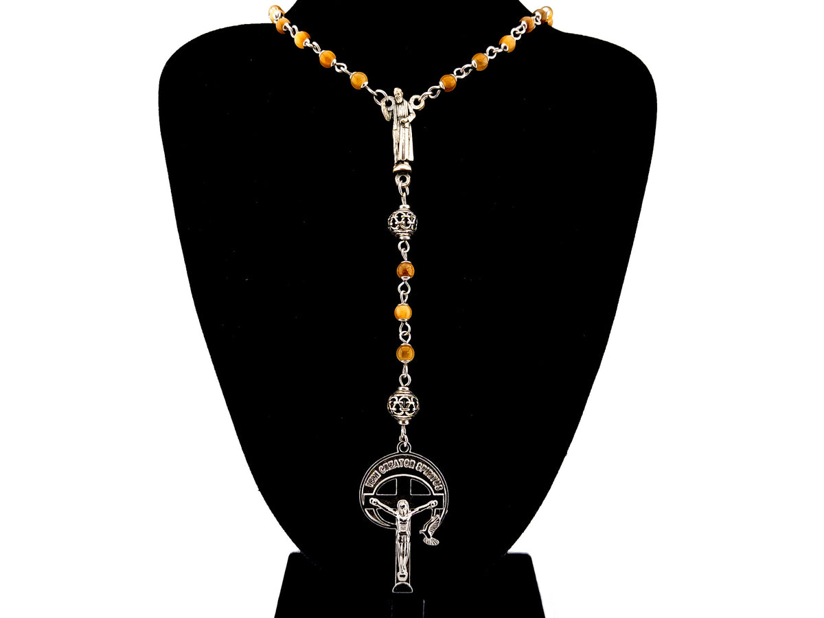 Saint Padre Pio tigers eye gemstone and silver rosary bead necklace with stainless steel crucifix.