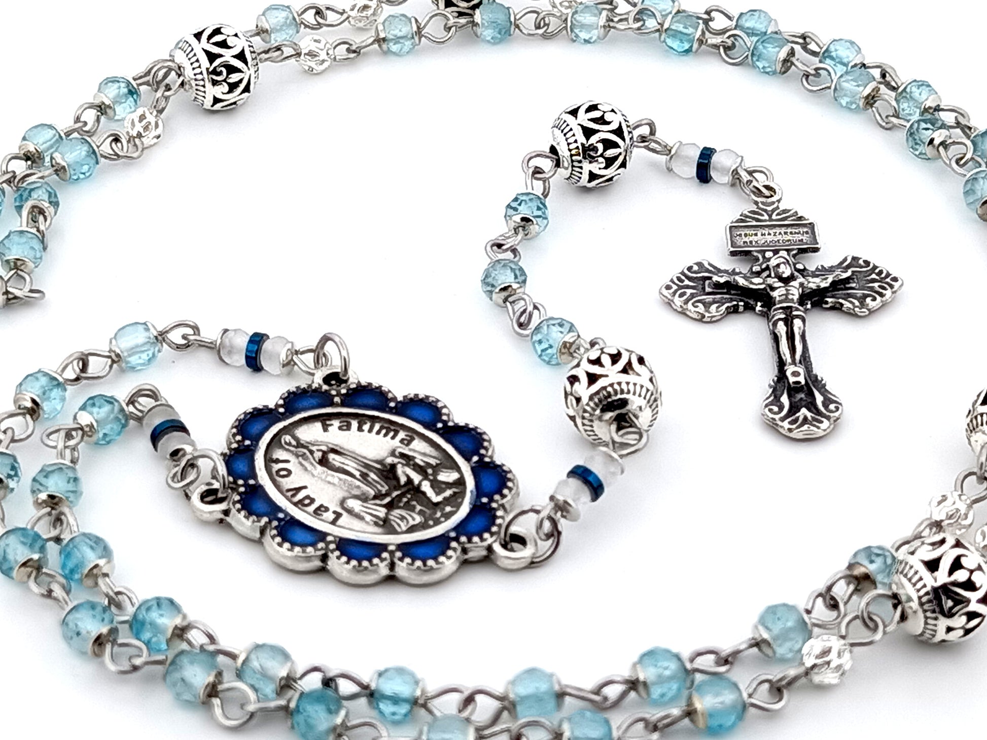 Our Lady of Fatima blue topaz gemstone unique rosary beads with 925 sterling silver pardon crucifix.