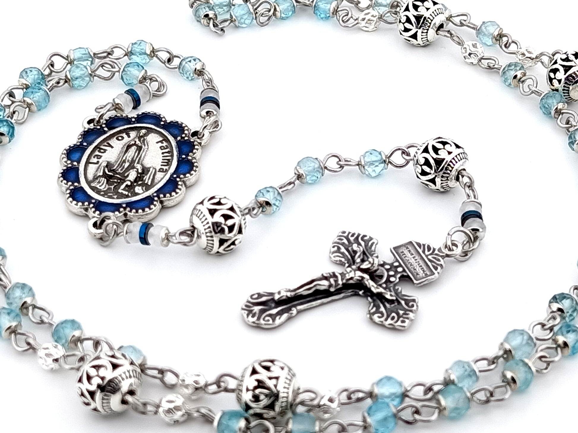 Our Lady of Fatima blue topaz gemstone unique rosary beads with 925 sterling silver pardon crucifix.