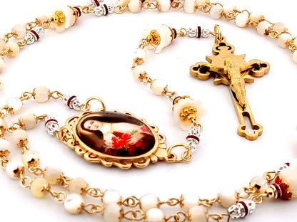 Saint Therese of Lisieux mother of pearl unique rosary beads with gold plated Saint Benedict crucifix.