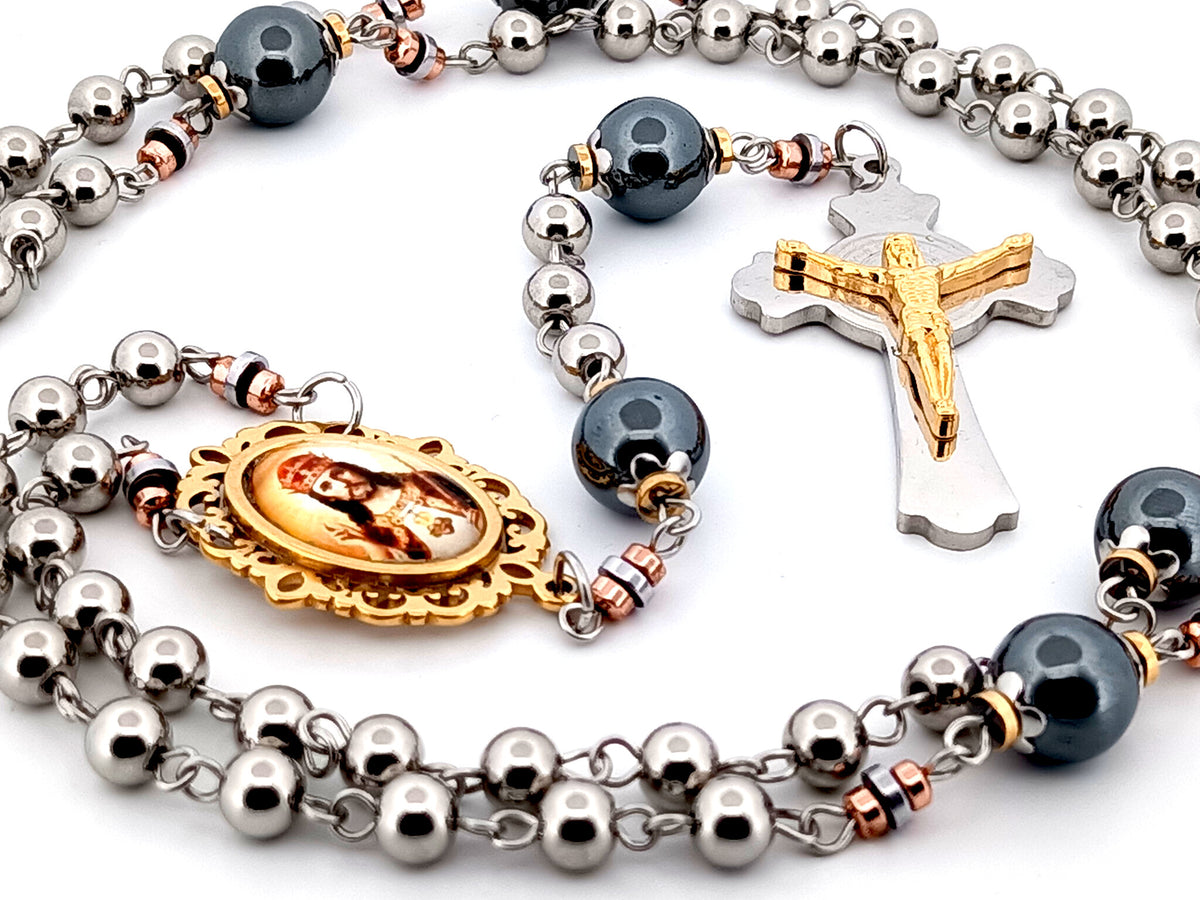 Christ the King stainless steel and hematite gemstone unique rosary beads with stainless steel Saint Benedict crucifix.