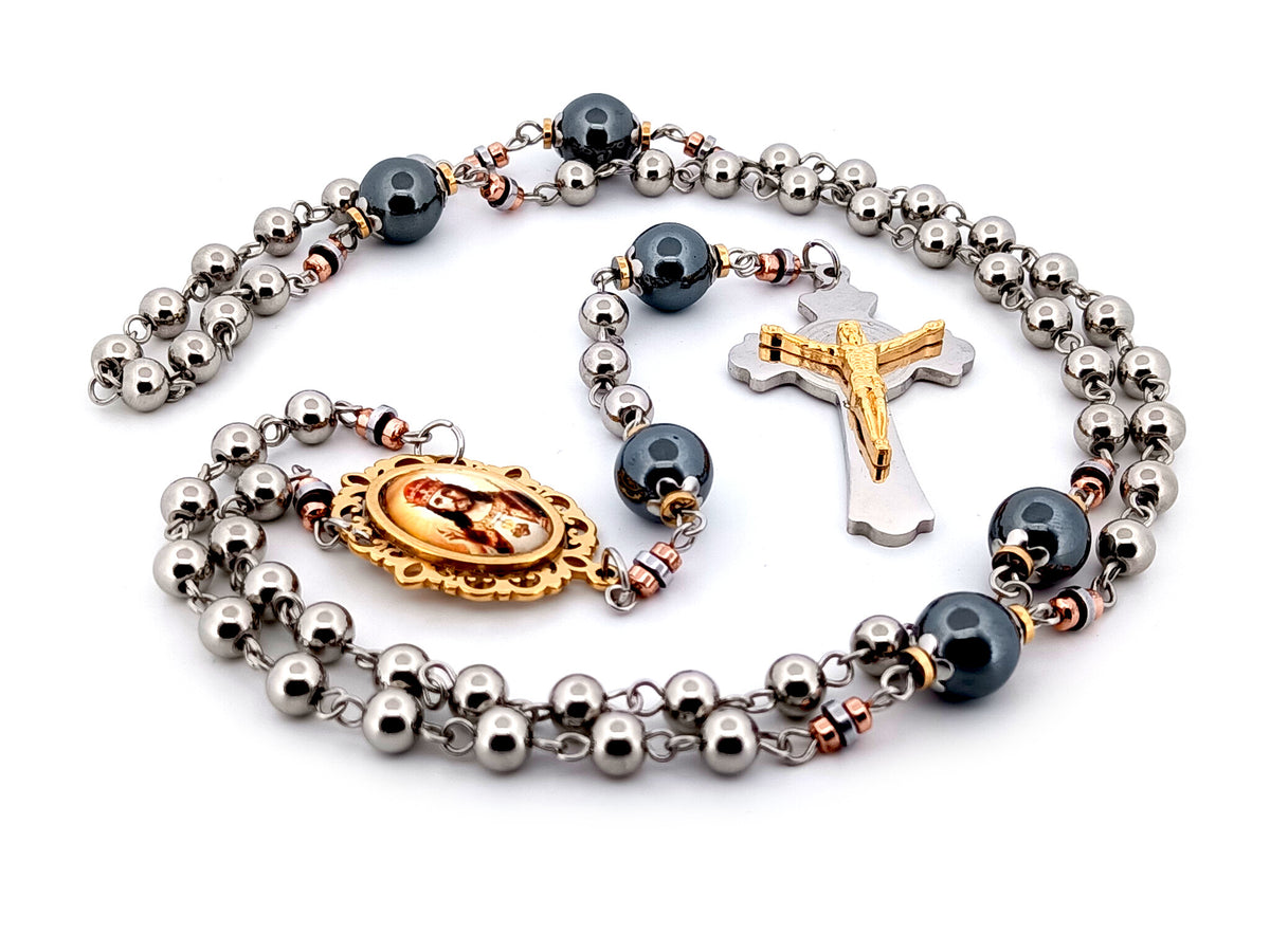 Christ the King stainless steel and hematite gemstone unique rosary beads with stainless steel Saint Benedict crucifix.