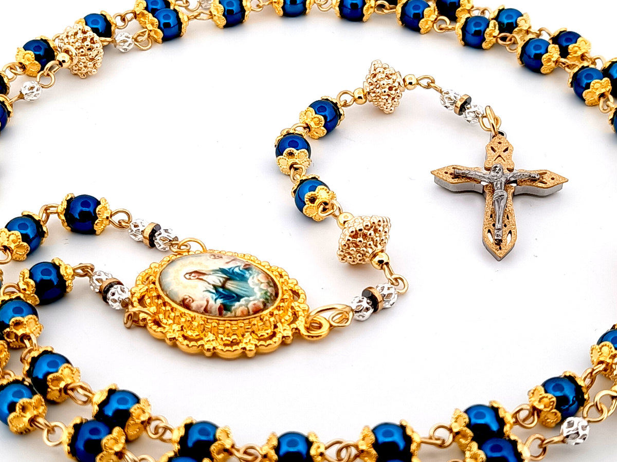 The Assumption of Mary blue hematite gemstone and gold unique rosary beads with layered stainless steel crucifix.