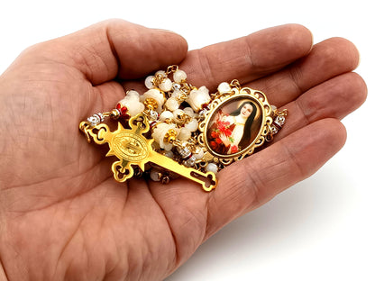 Saint Therese of Lisieux mother of pearl unique rosary beads with gold plated Saint Benedict crucifix.