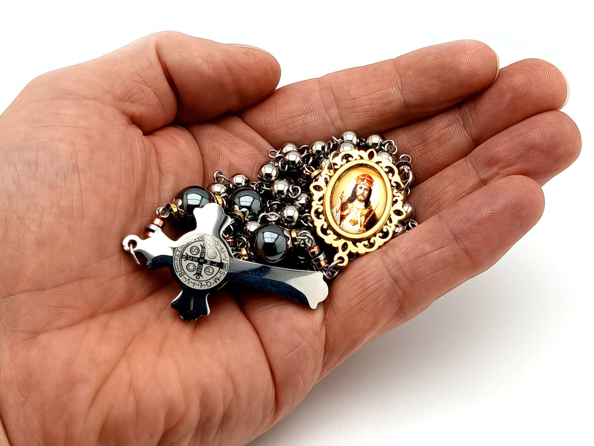 Christ the King stainless steel and hematite gemstone unique rosary beads with stainless steel Saint Benedict crucifix.