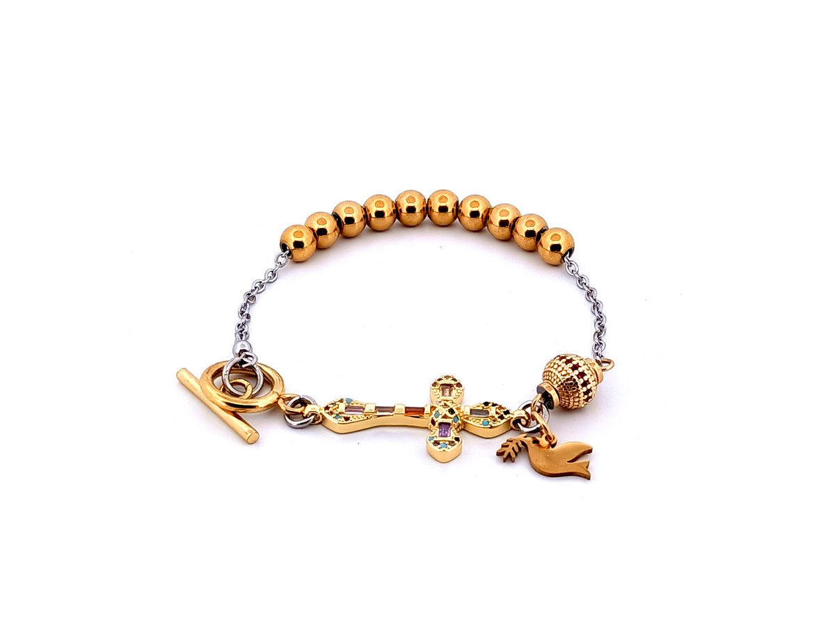 Holy Spirit gold plated stainless steel single decade rosary bead bracelet with 18K cubic zirconia cross.