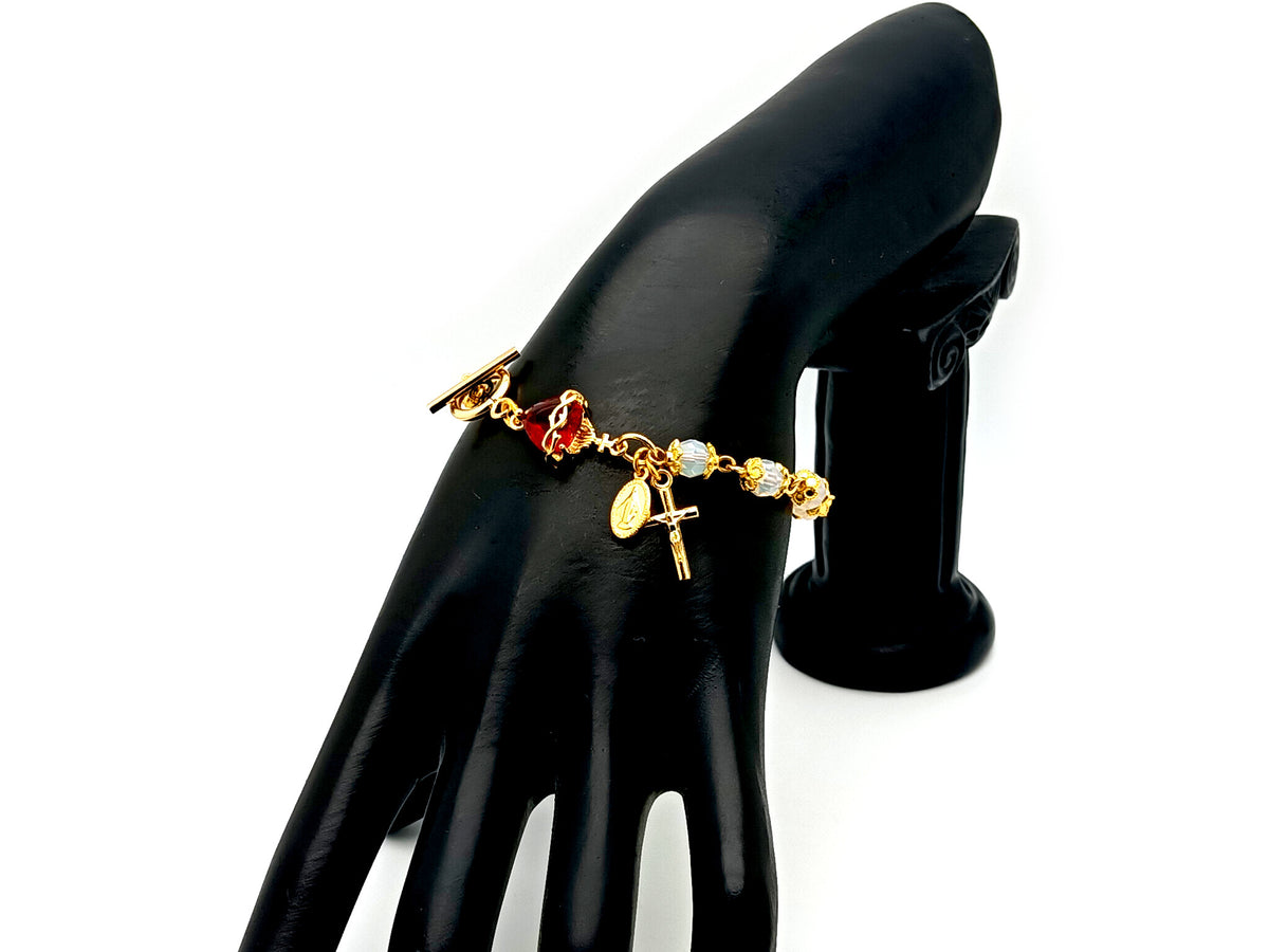 Sacred Heart Preciosa crystal and 18ct gold single decade rosary bead bracelet with Miraculous medal.