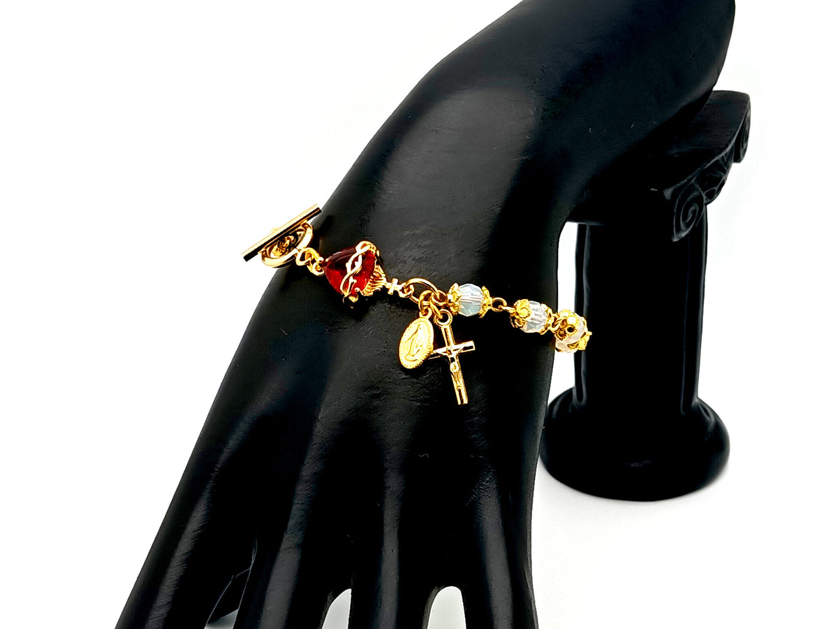 Sacred Heart Preciosa crystal and 18ct gold single decade rosary bead bracelet with Miraculous medal.