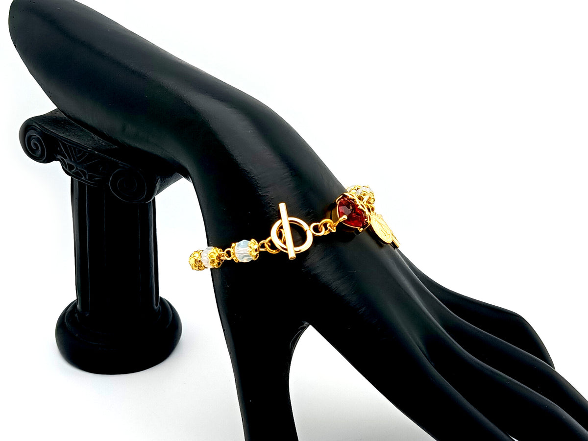 Sacred Heart Preciosa crystal and 18ct gold single decade rosary bead bracelet with Miraculous medal.