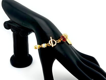 Sacred Heart Preciosa crystal and 18ct gold single decade rosary bead bracelet with Miraculous medal.