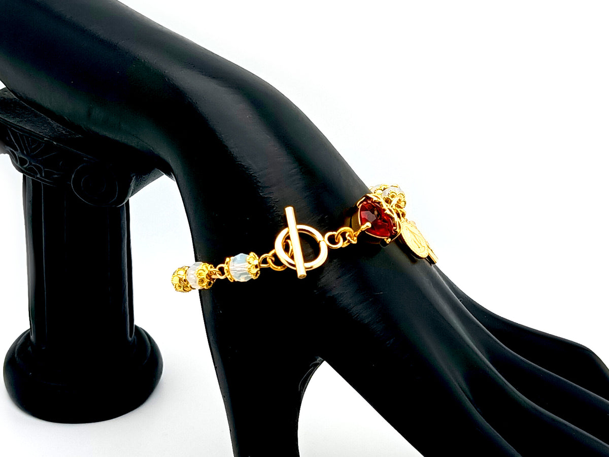 Sacred Heart Preciosa crystal and 18ct gold single decade rosary bead bracelet with Miraculous medal.