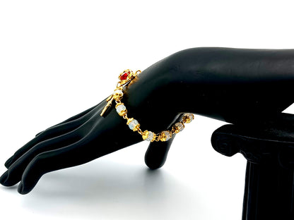 Sacred Heart Preciosa crystal and 18ct gold single decade rosary bead bracelet with Miraculous medal.