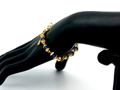 Miraculous medal blue Preciosa crystal single decade rosary bead bracelet with 18ct gold cubic zirconia cross.