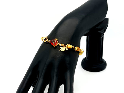 Sacred Heart tigers eye gemstone and crystal 18ct gold single decade rosary bead bracelet with Holy Spirit medal.