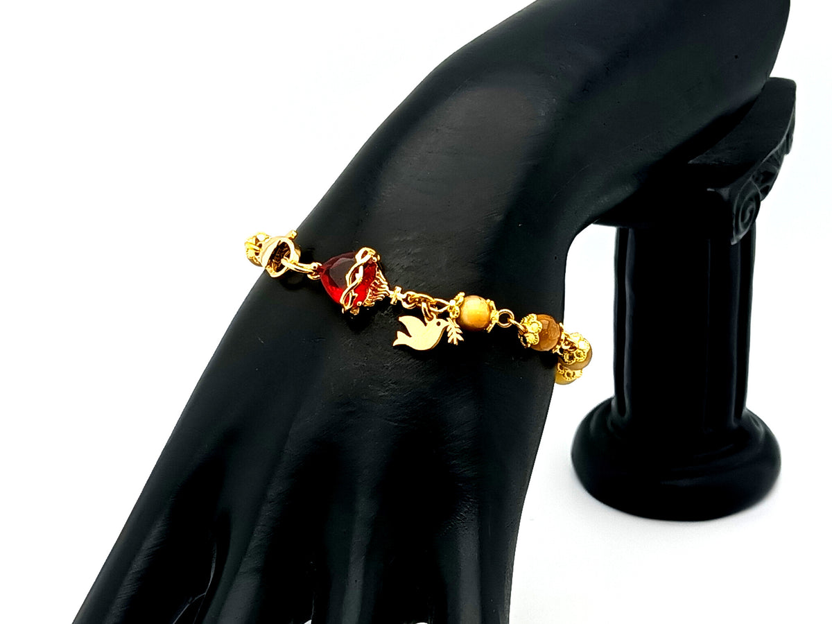 Sacred Heart tigers eye gemstone and crystal 18ct gold single decade rosary bead bracelet with Holy Spirit medal.