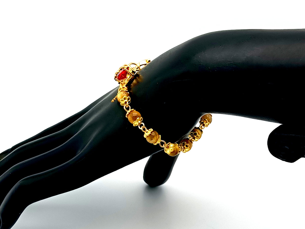 Sacred Heart tigers eye gemstone and crystal 18ct gold single decade rosary bead bracelet with Holy Spirit medal.