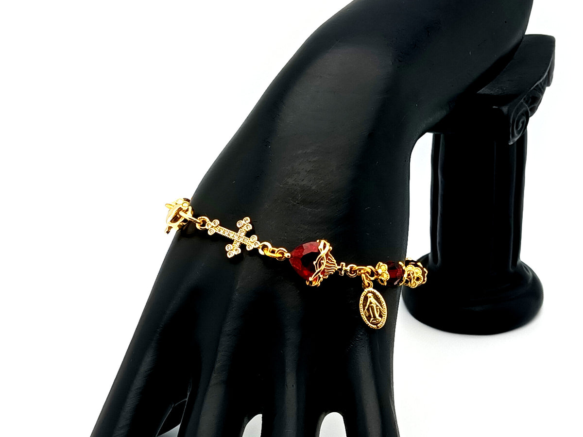 Sacred Heart of Jesus red crystal and gold single decade unique rosary bead bracelet with 18K cubic zirconia cross and Miraculous medal. 