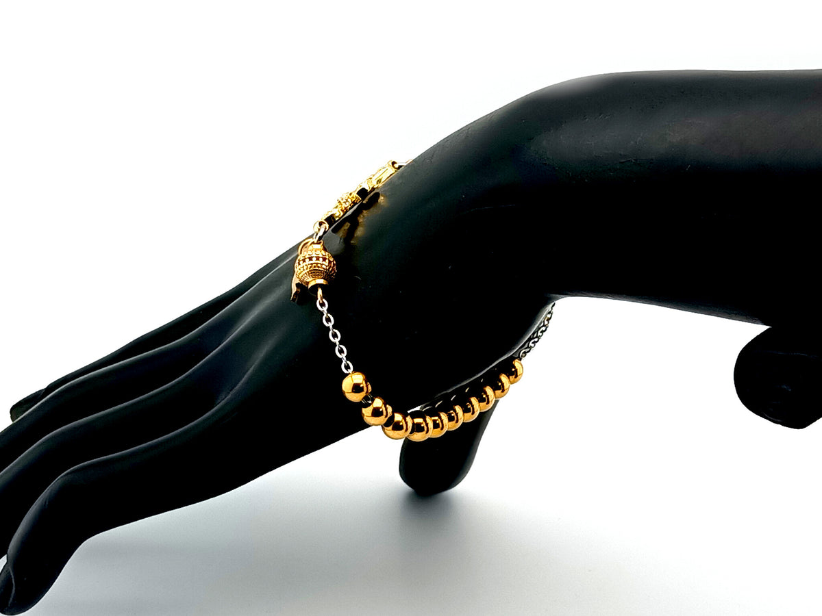 Holy Spirit gold plated stainless steel single decade rosary bead bracelet with 18K cubic zirconia cross. 