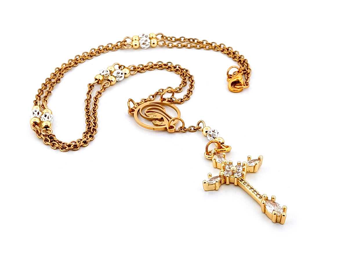 Praying Virgin Mary 925 sterling silver and 18K gold plated stainless steel necklace with small cubic zirconia crucifix.
