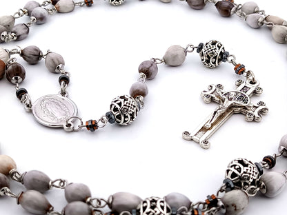 Our Lady of Guadalupe Jobs tears and silver unique rosary beads with Saint Benedict crucifix.