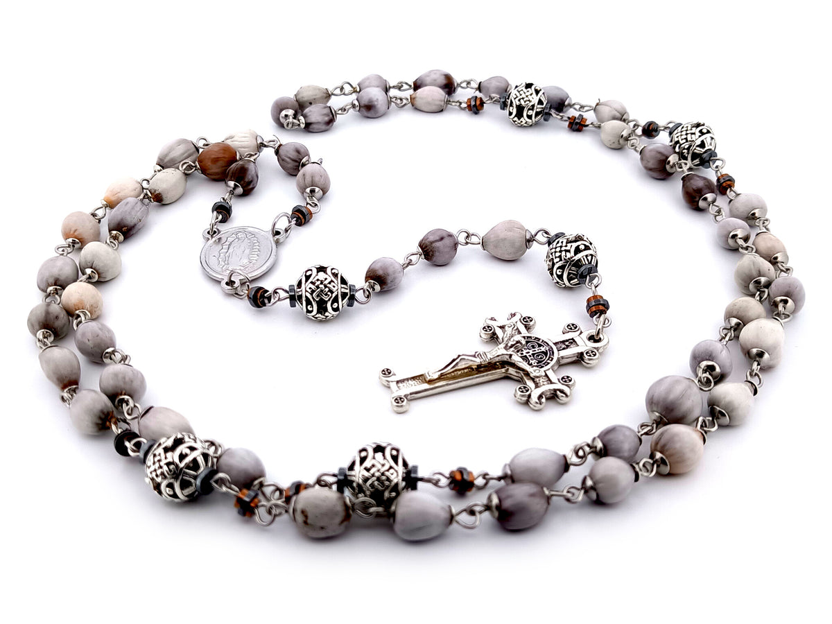 Our Lady of Guadalupe Jobs tears and silver unique rosary beads with Saint Benedict crucifix.