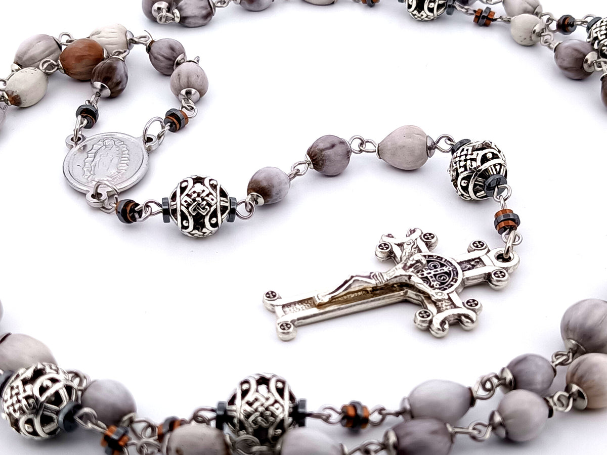 Our Lady of Guadalupe Jobs tears and silver unique rosary beads with Saint Benedict crucifix.