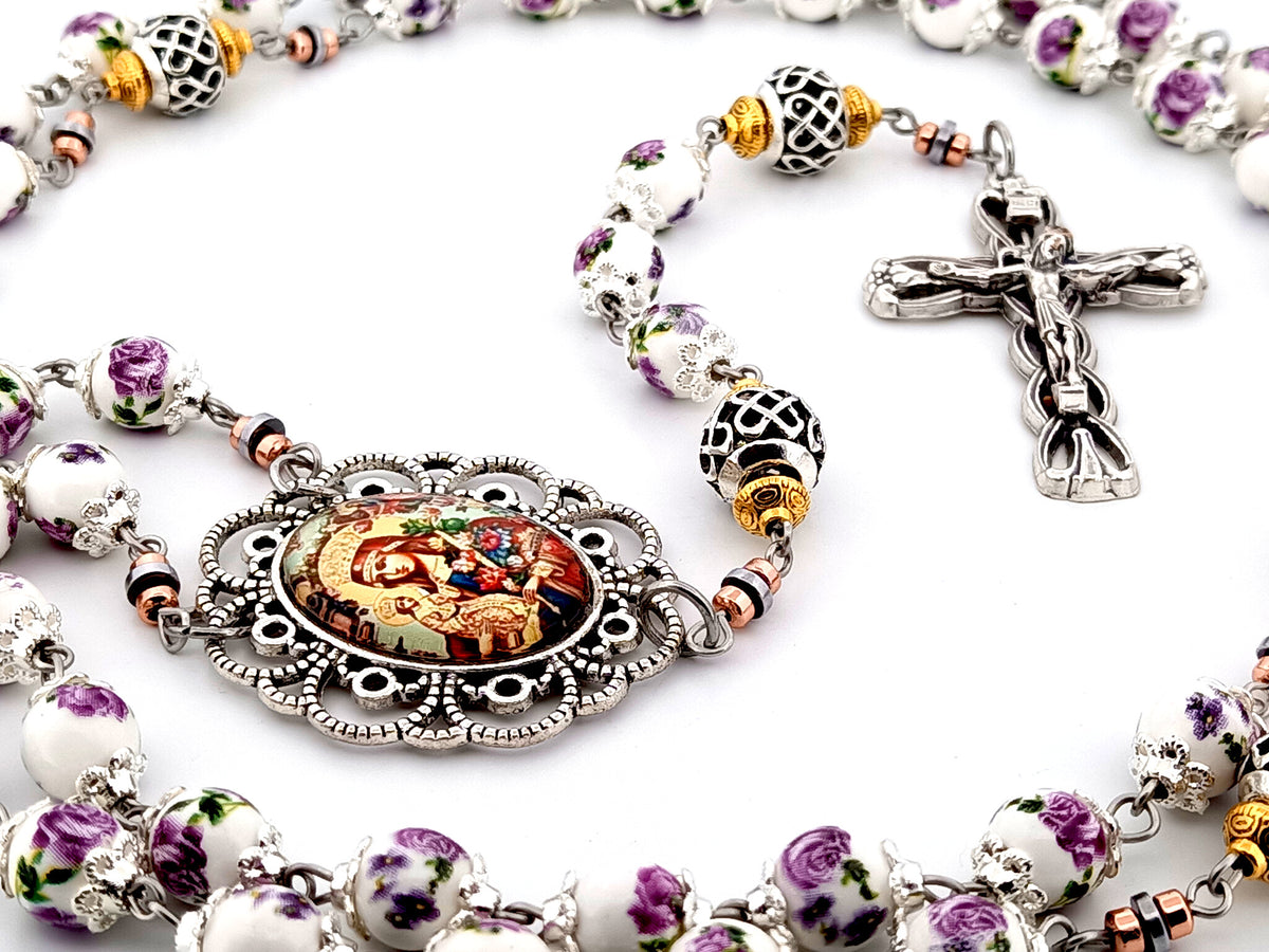 Our Lady of Perpetual Help purple floral porcelain and silver unique rosary beads with silver lily crucifix.