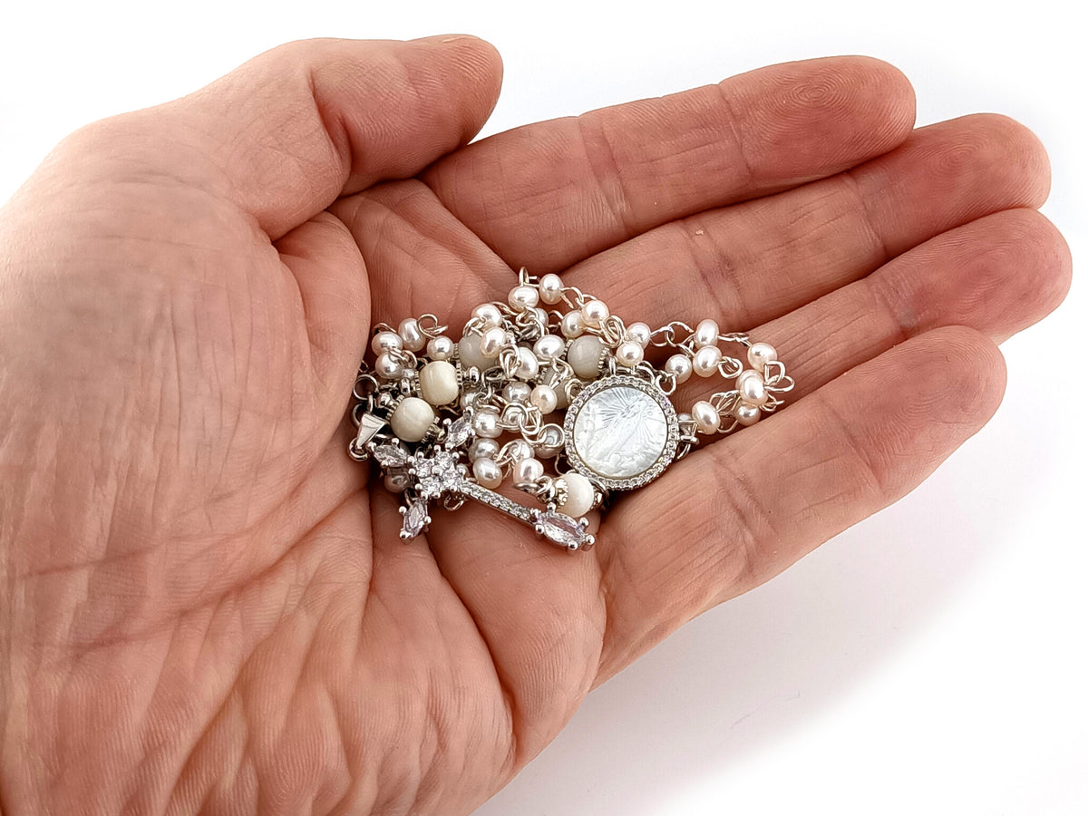 Our Lady of Fatima fresh water pearl unique rosary beads necklace with cubic zirconia cross.