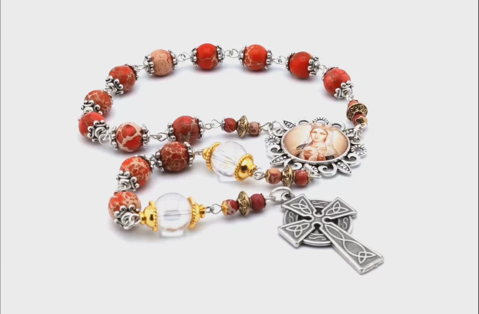 Our Lady of Fatima unique rosary beads single decade rosary with red gemstone beads, silver picture centre medal and Celtic cross.