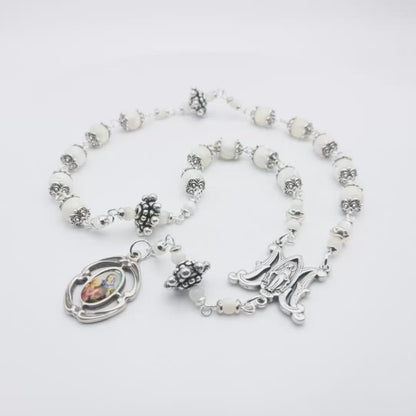 Saint Ann unique rosary beads prayer chaplet, with mother of pearl beads, silver picture medal, bead caps and miraculous medal centre.