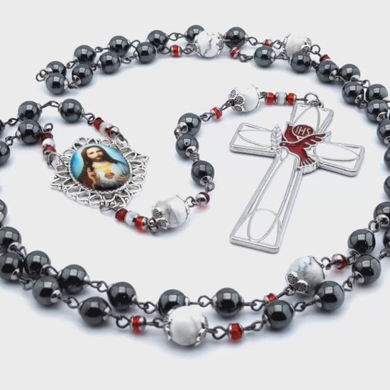 Sacred Heart unique rosary beads with hematite gemstone beads, silver and white enamel dove crucifix and picture centre medal.