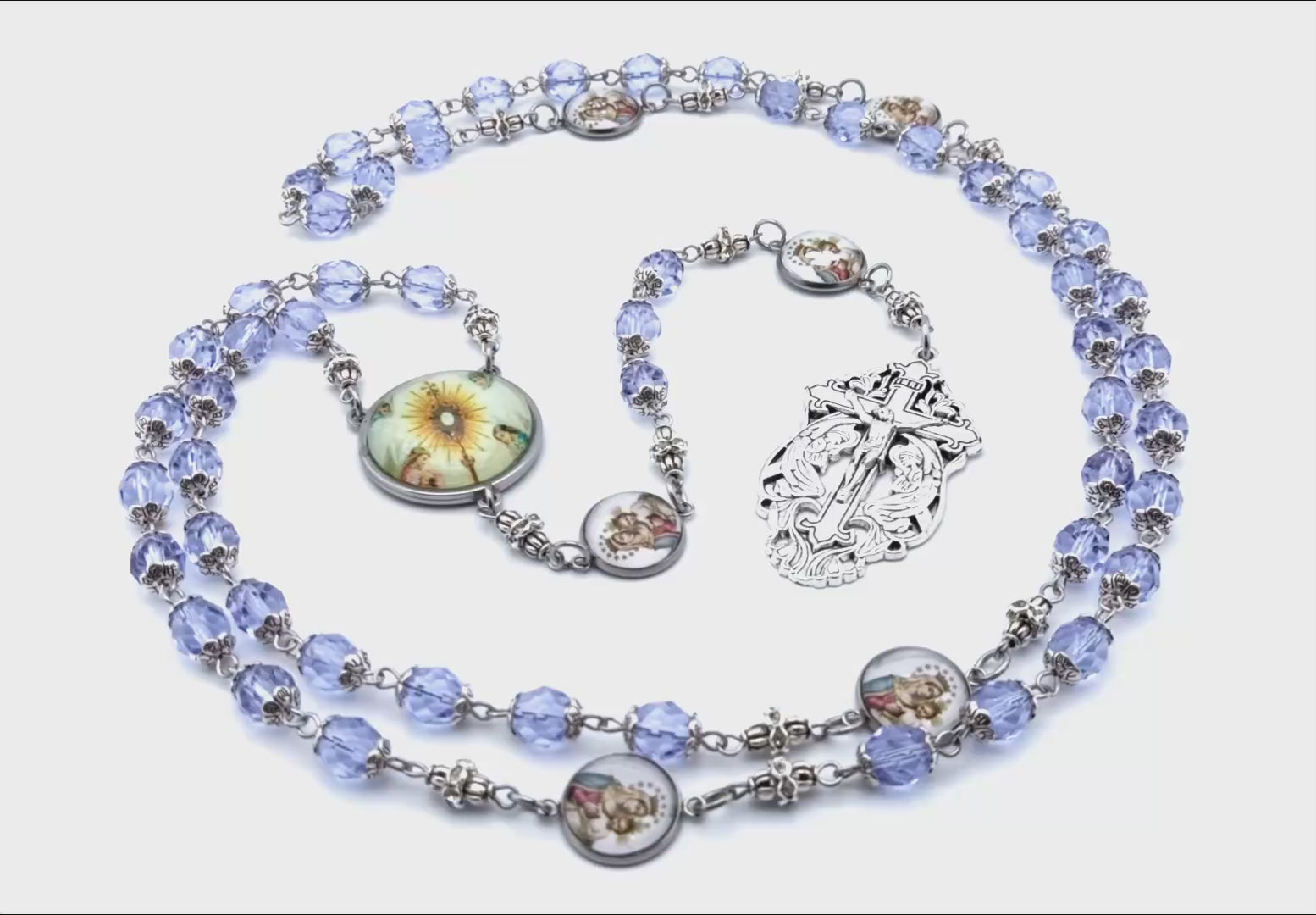 Our Lady of Mount Carmel unique rosary beads with lilac glass faceted beads, stainless steel picture centre medal and crucifix.