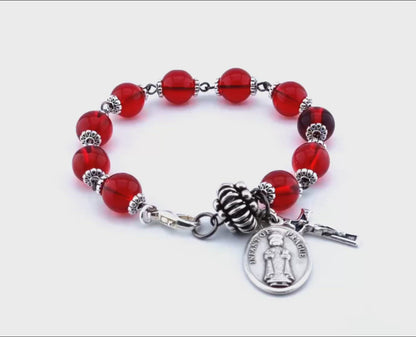 Infant of Prague unique rosary beads single decade bracelet with red glass beads, silver pater bead, crucifix and medal.