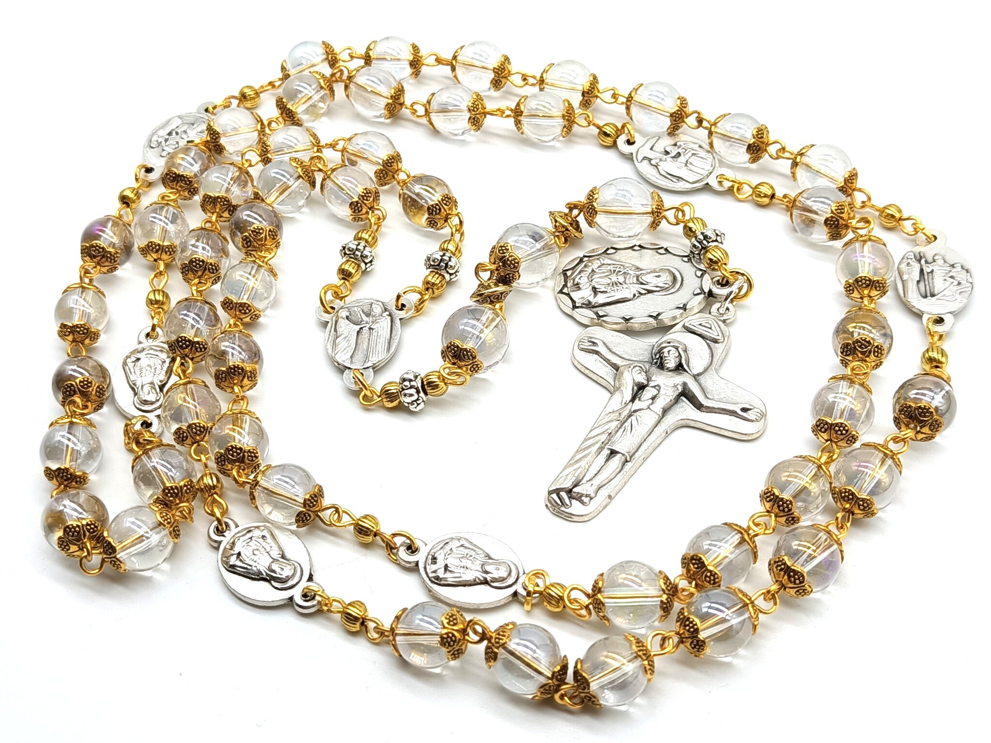 Glass and gold unique dolor rosary beads with silver dolour medals, crucifix and gold bead caps.