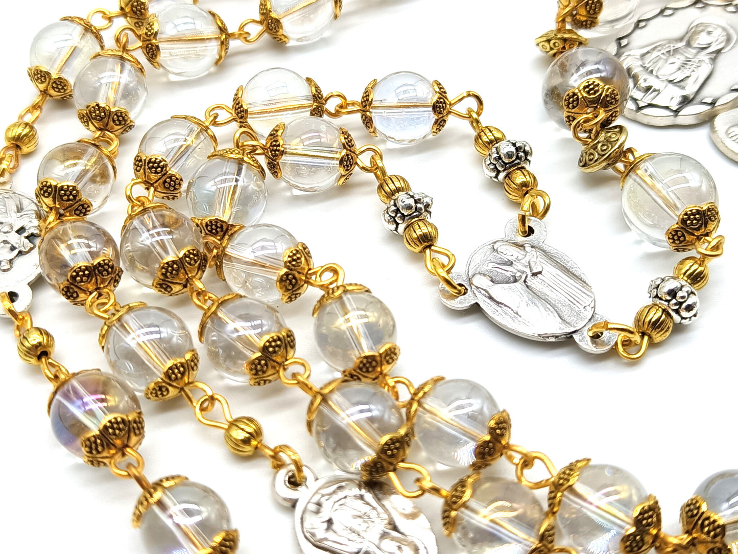 Glass and gold unique dolor rosary beads with silver dolour medals, crucifix and gold bead caps.