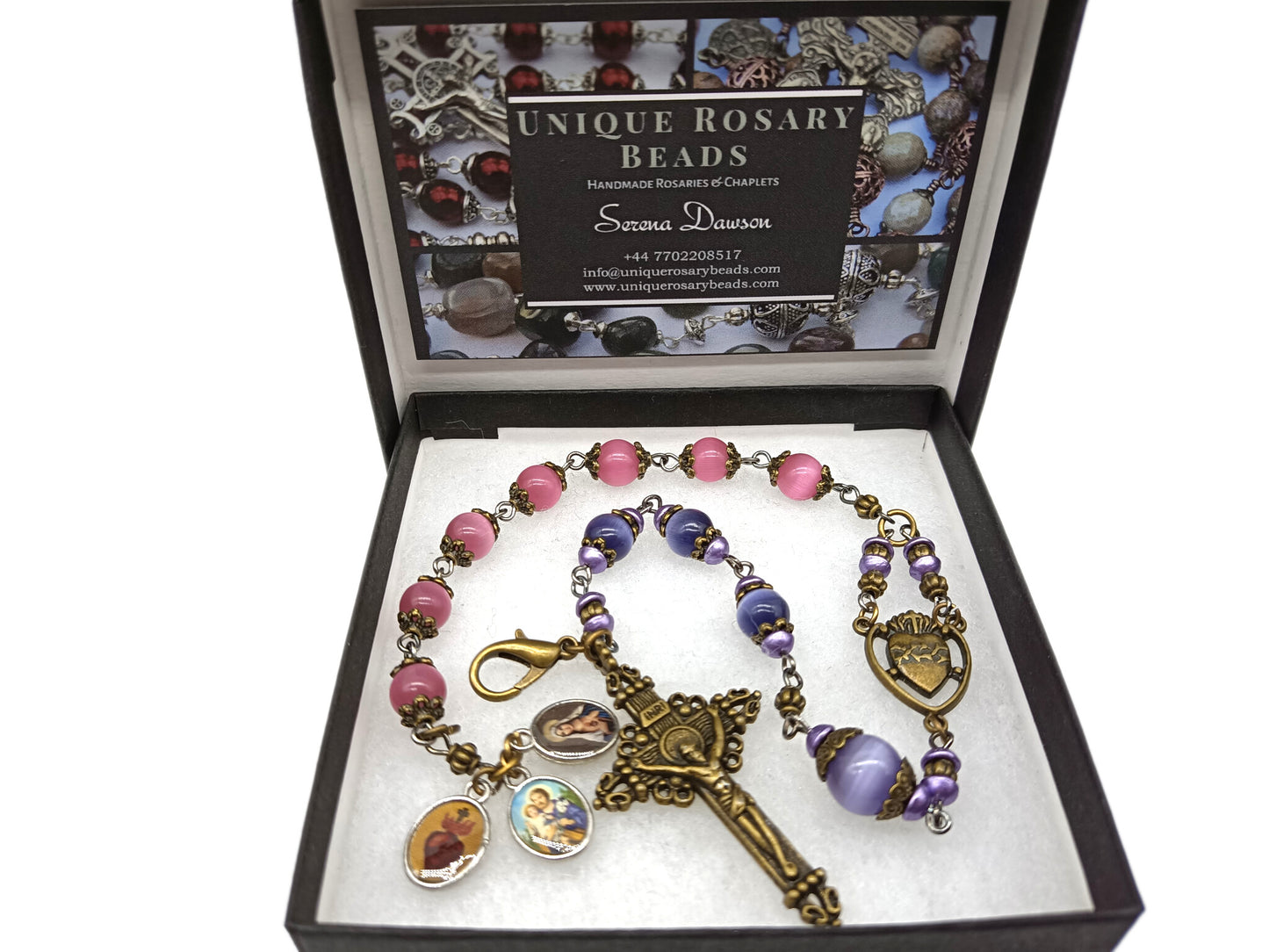 Pocket servite unique dolor rosary in pink and blue glass beads and bronze crucifix and medal.