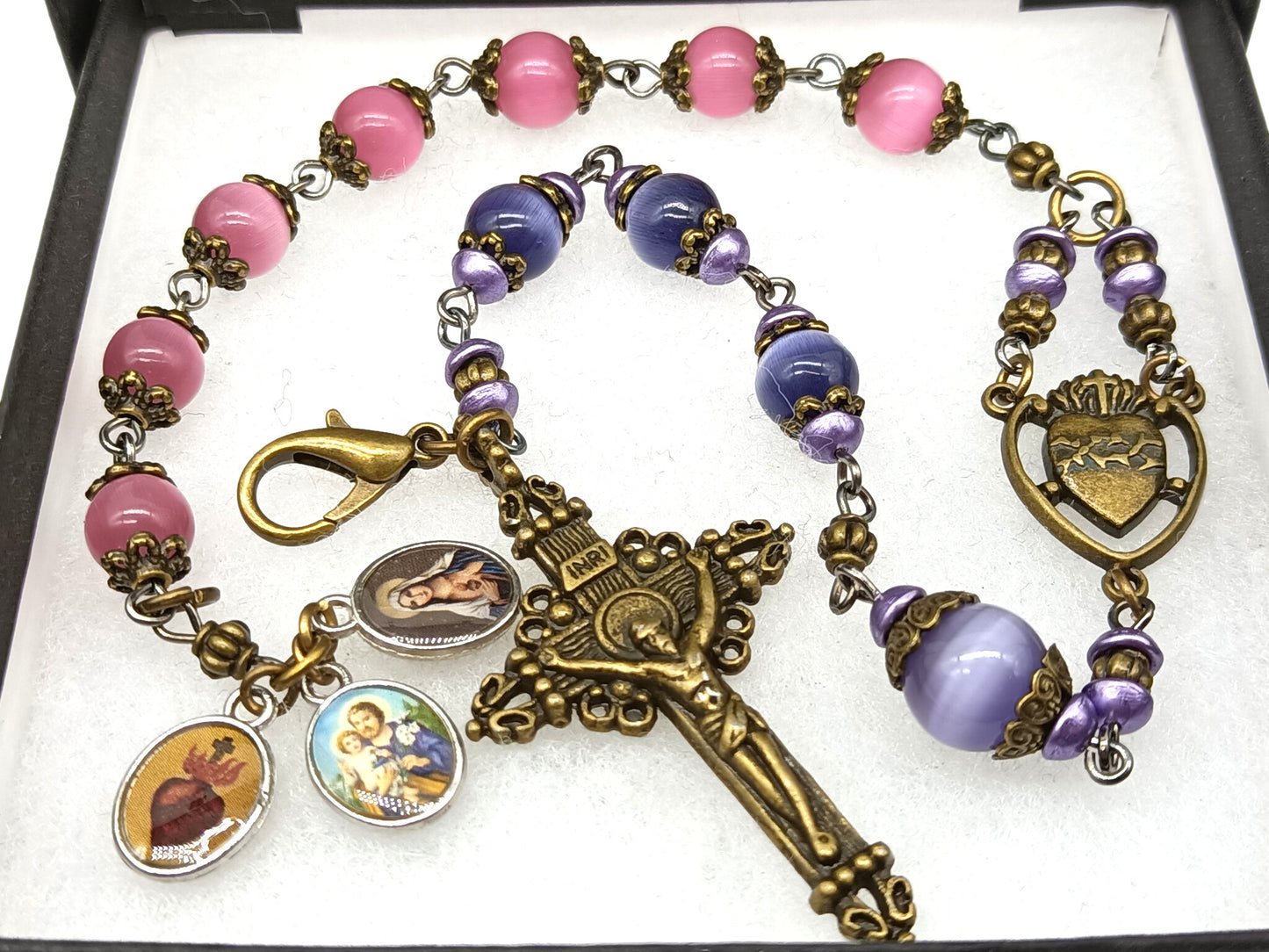 Pocket servite unique dolor rosary in pink and blue glass beads and bronze crucifix and medal.