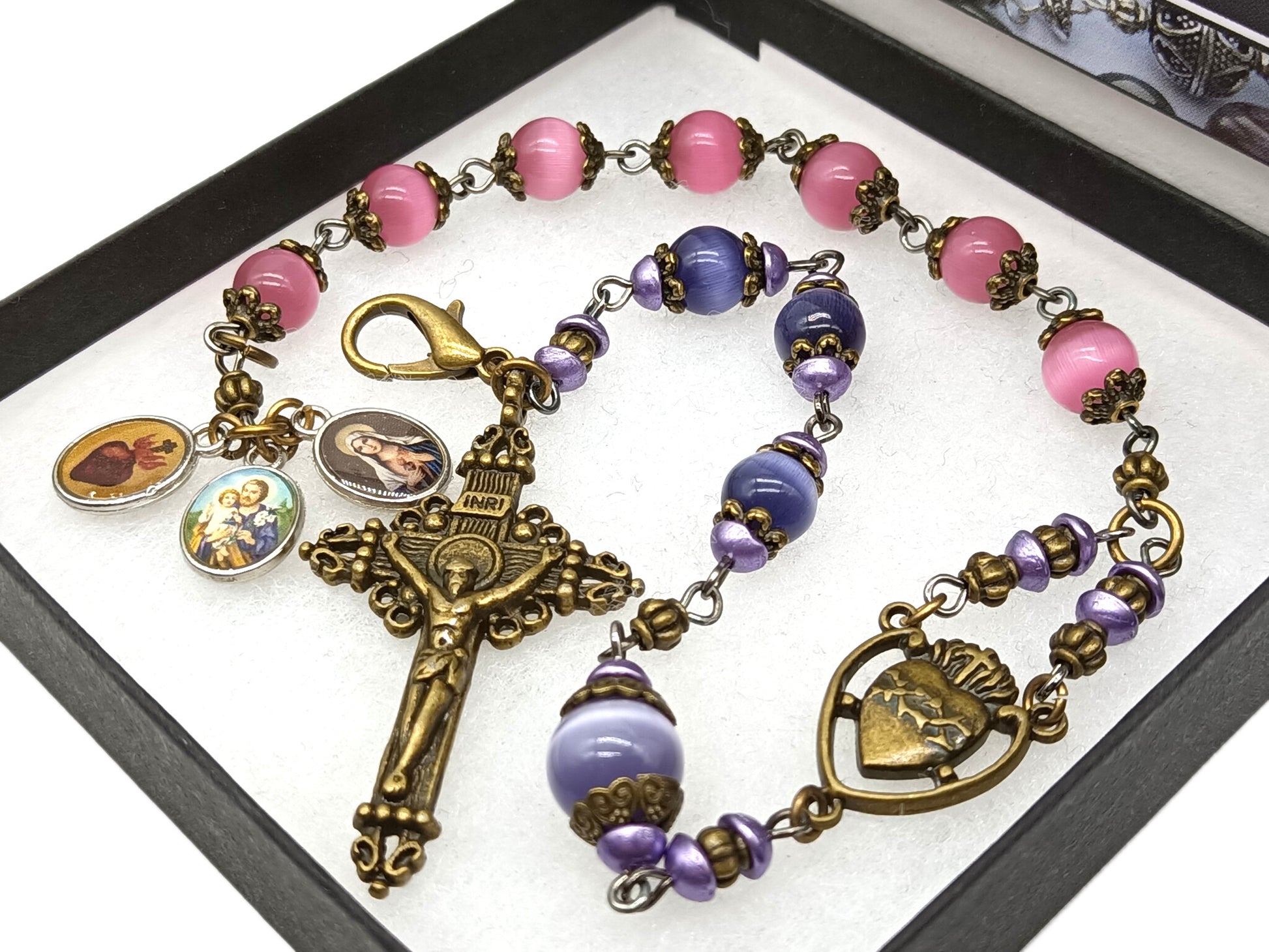 Pocket servite unique dolor rosary in pink and blue glass beads and bronze crucifix and medal.