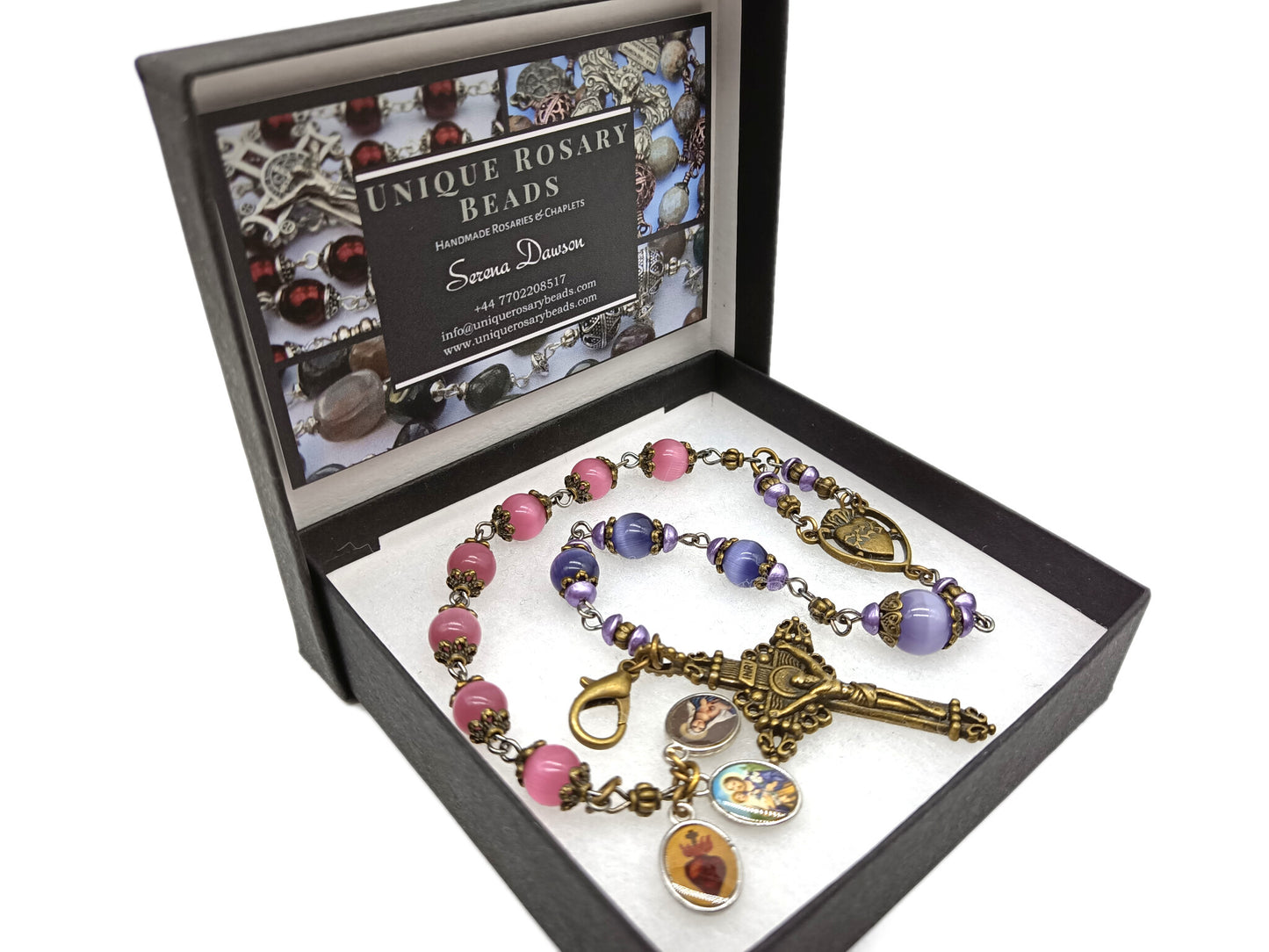 Pocket servite unique dolor rosary in pink and blue glass beads and bronze crucifix and medal.