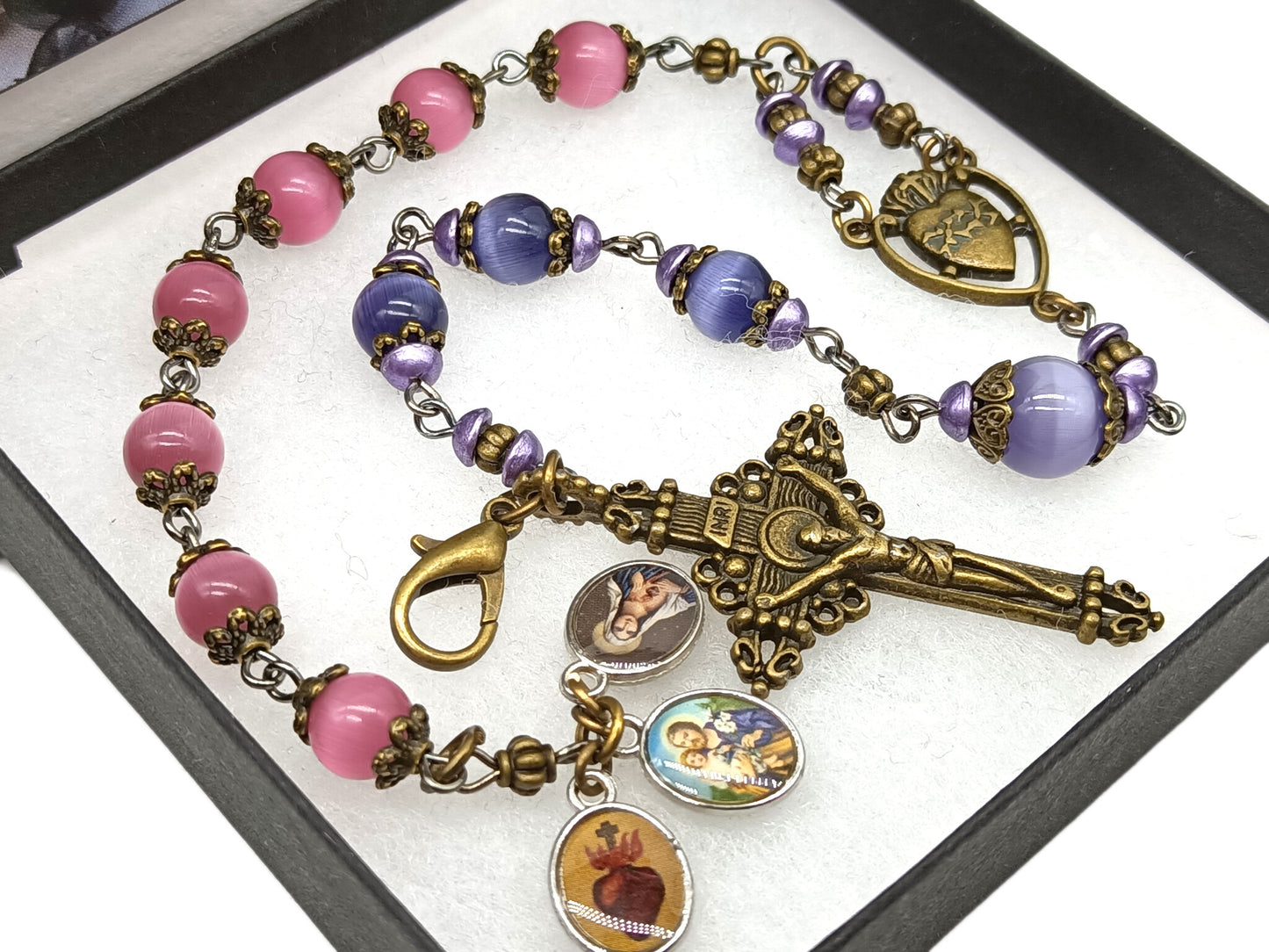 Pocket servite unique dolor rosary in pink and blue glass beads and bronze crucifix and medal.