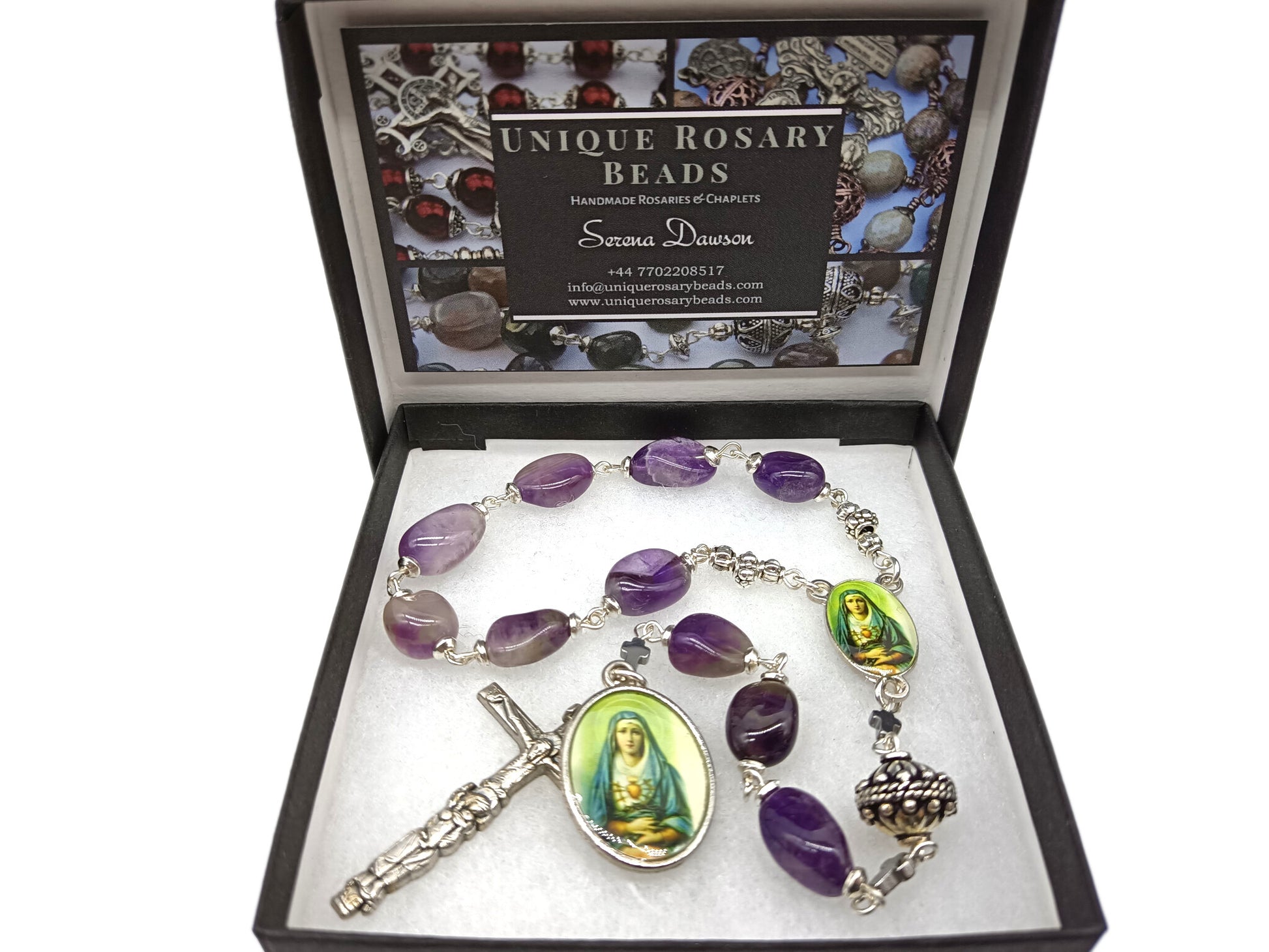 Pocket servite unique dolor rosary with purple gemstone beads and silver crucifix and Our Lady of Sorrows medals.