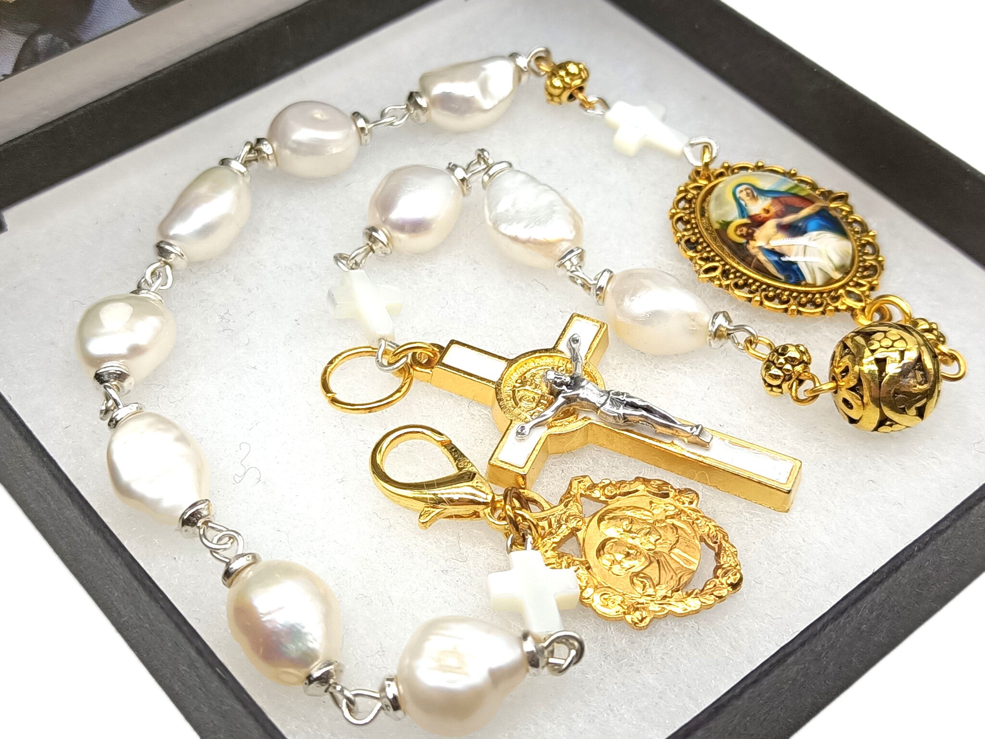 Pocket servite unique rosary beads with fresh water pearl beads and gold crucifix, medals and clasp.